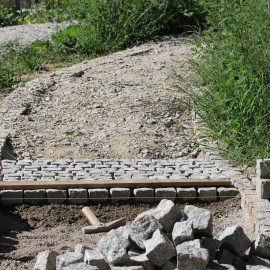 powiększ zdjęcie: Postęp prac przy przebudowie alejek parkowych w parku Miejskim